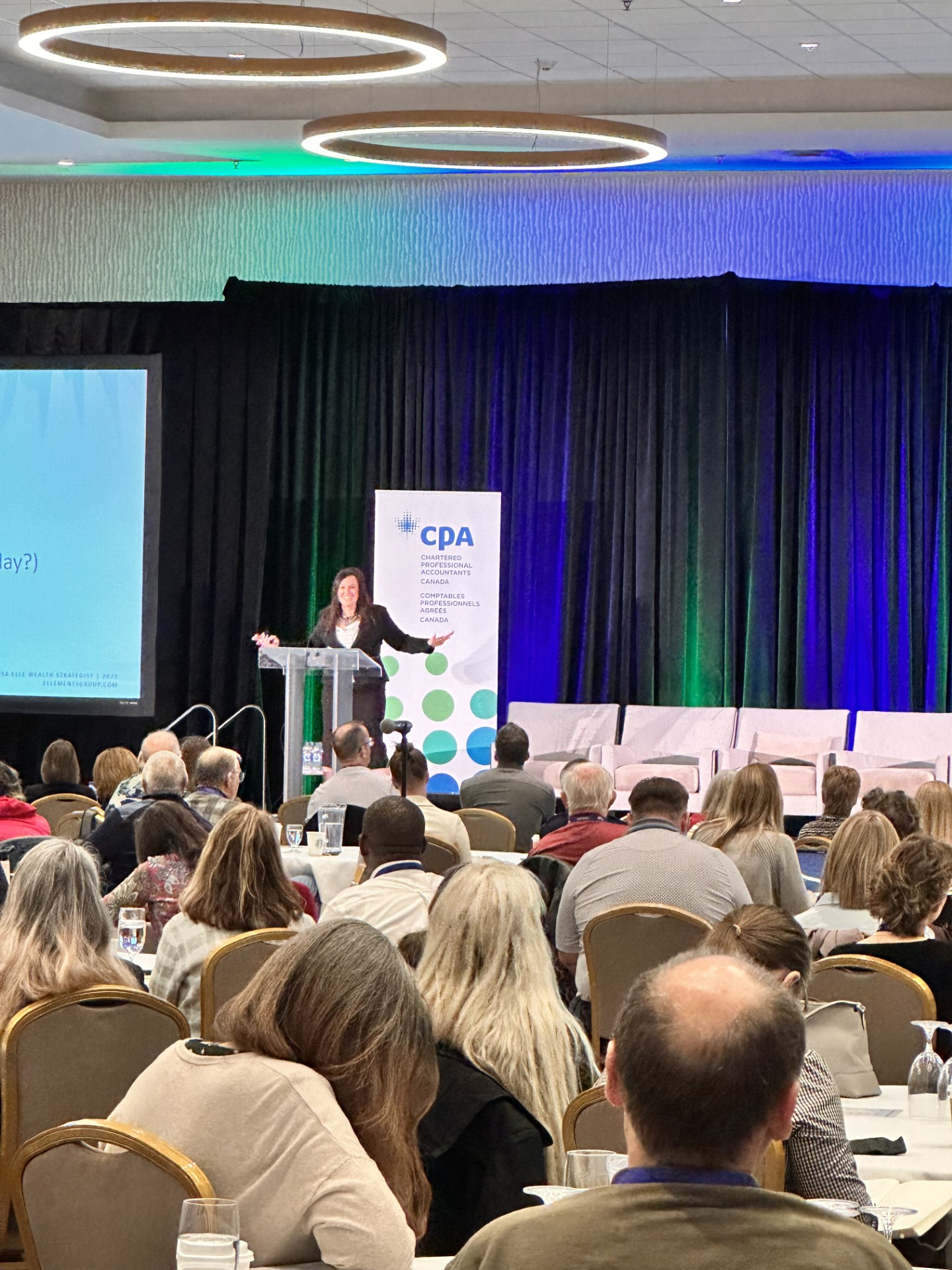 Lisa Elle on stage at a CPA Canada conference